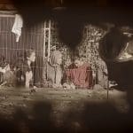A picture of refugees behind railings at Manston detention centre