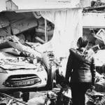 A woman looking at the earthquake devastation in Hatay, Turkey - a Kurdish area