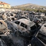 An image of dozens of burned cars after Israeli settlers rioted in Huwara attacking Palestinians