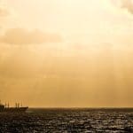 Boat sailing through the high seas in relation to the Tyler Prize winners comments around a new treaty