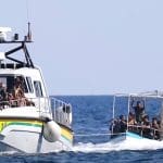 Refugees in a boat off the Italian coast as more have died coming from Libya