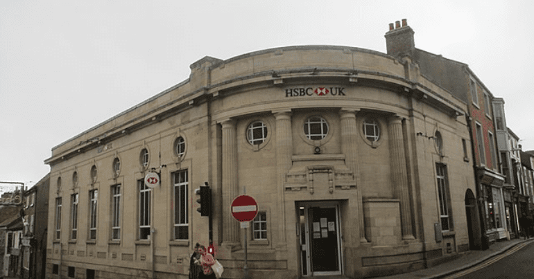 HSBC bank storefront - Chinese government accused of human rights abuses of Hong Kong citizens via British banks