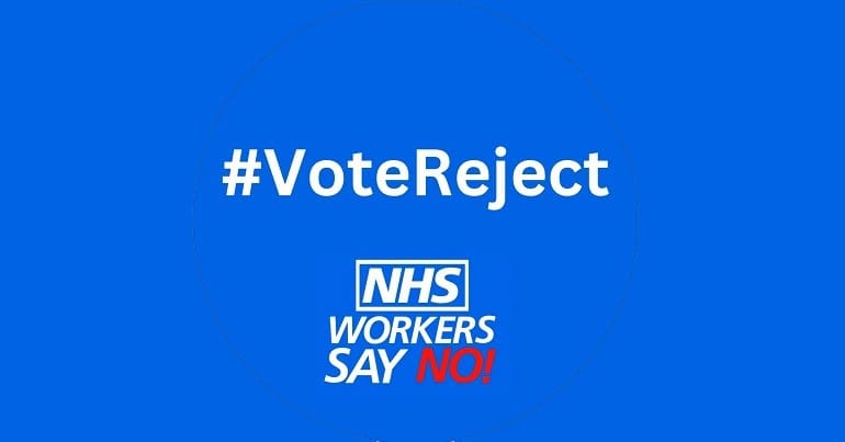An NHS campaign sign that says #VoteReject NHS Workers Say No as the RCN accepts the Tories pay offer