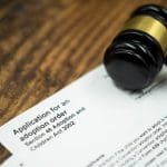 An adoption order The industry in the UK is marred by racism ableism and classism