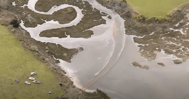 Aerial view of Perenco oil spill in Poole Harbour.