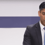 Rishi Sunak looking worried, as Budget Day will see strikes from the NEU and more