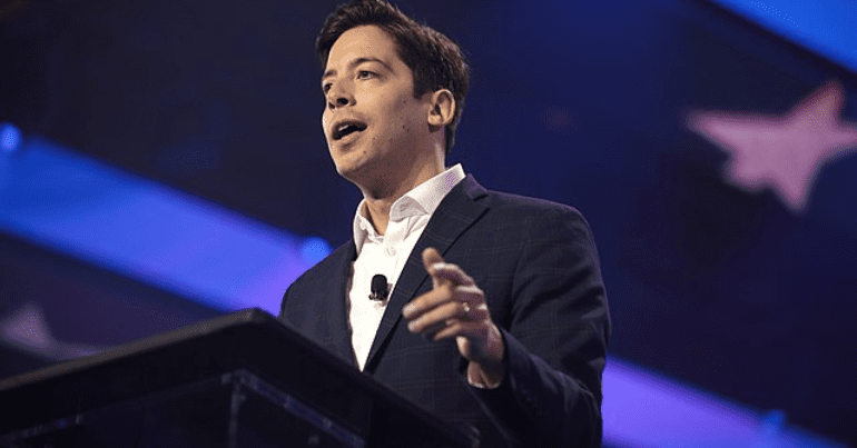 Michael Knowles speaks at a podium