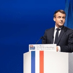 Macron at a podium