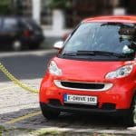 Electric car charging. Transition minerals for electric vehicles like this are driving human rights abuses in the Global South.