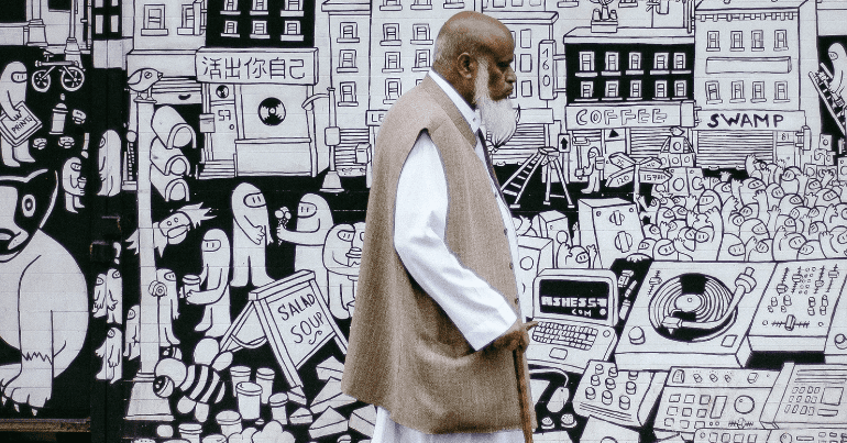 A man walks on Brick Lane during Ramadan cost of living crisis