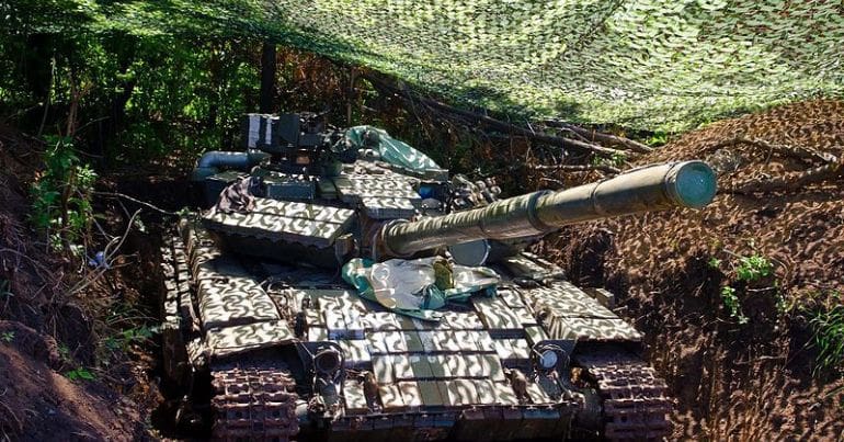 Tank under scrim nets, Ukraine