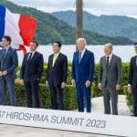 G7 leaders stand together in a line at the Hiroshima summit in May 2023.