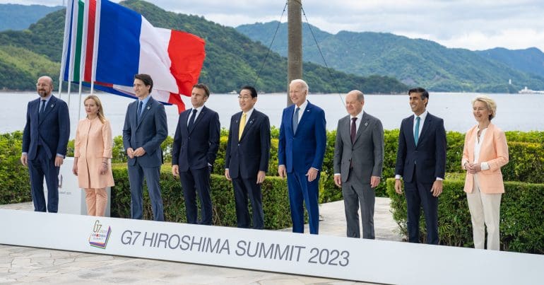G7 leaders stand together in a line at the Hiroshima summit in May 2023.