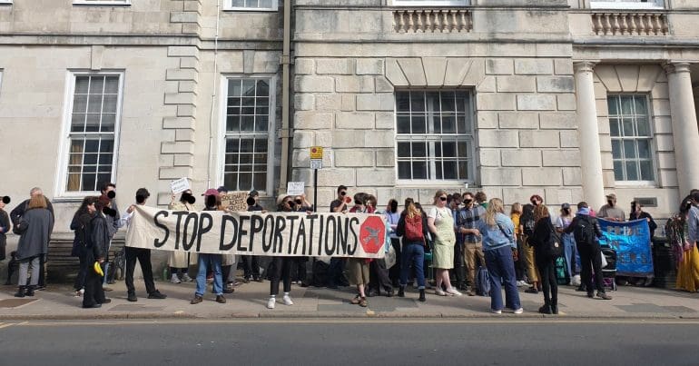 A protest outside a court over the trial of protesters who blocked a Jamaica deportation flight