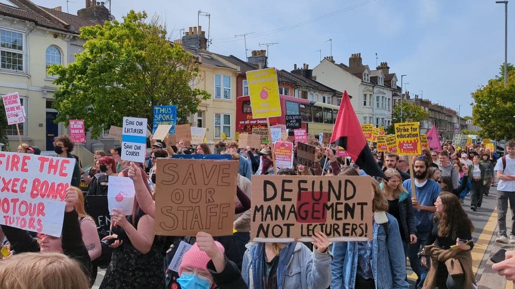 Students and staff from the University of Brighton protest over redundancies