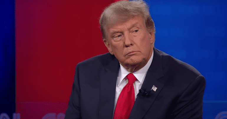 Donald Trump seated at a CNN town hall