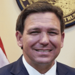 DeSantis poses with flags