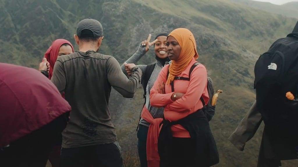Screenshot from Muslim Hikers, showing several Brown women on Snowdon. The right to roam is a race issue as much as it is a class one. Access to nature