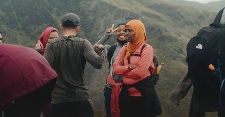 Screenshot from Muslim Hikers, showing several Brown women on Snowdon. The right to roam is a race issue as much as it is a class one. Access to nature