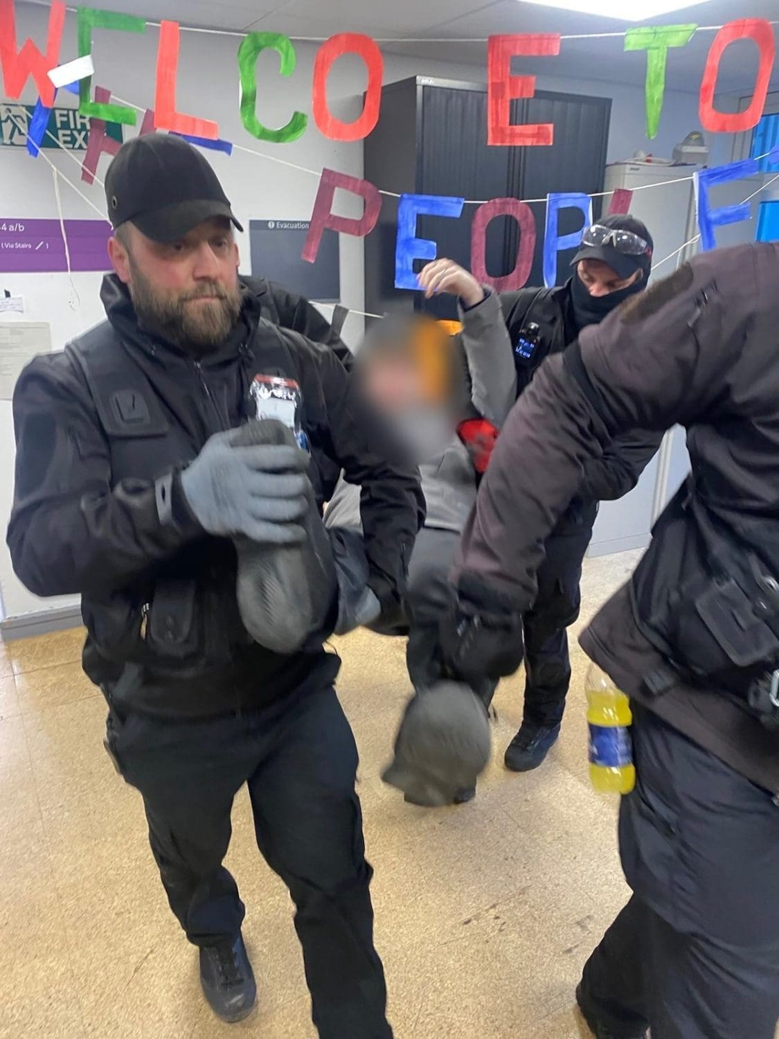 Bailiffs removing students