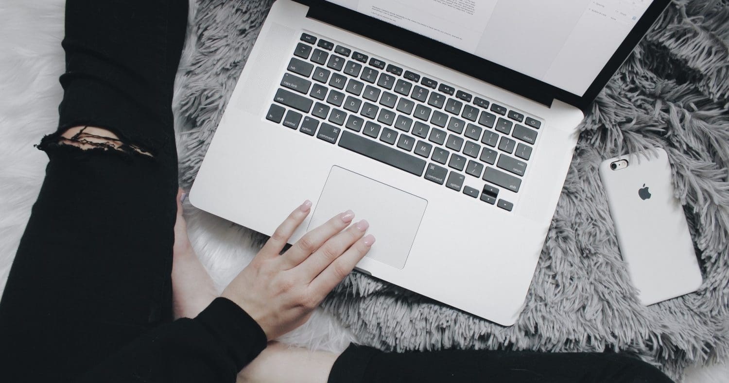 A woman sat at her laptop in relation to a recent abortion case