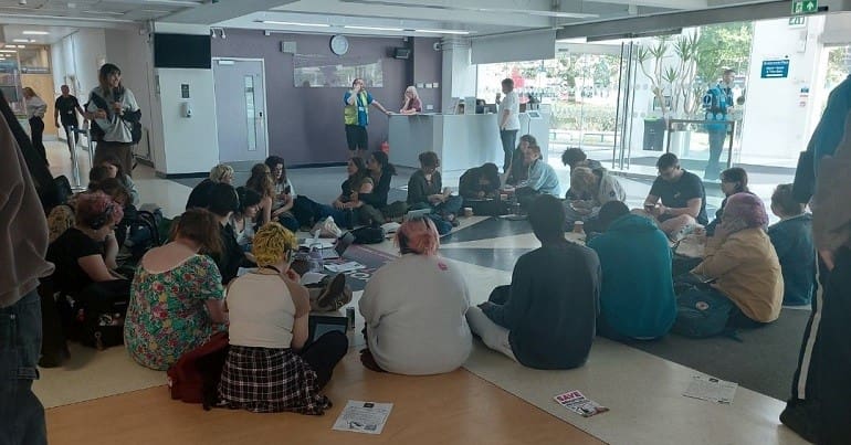 Brighton University students and staff staging a sit in