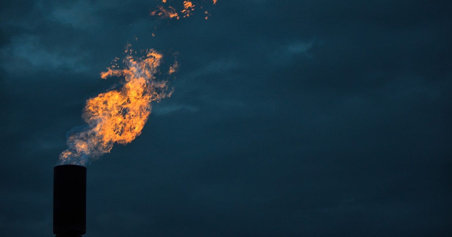 Methane burns from a flaring unit at a solid waste landfill.