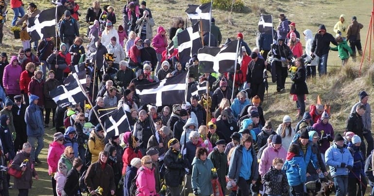 People rallying with Kernow flags in Cornwall