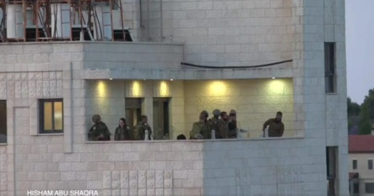 Israeli soldiers storm a Ramallah neighbourhood