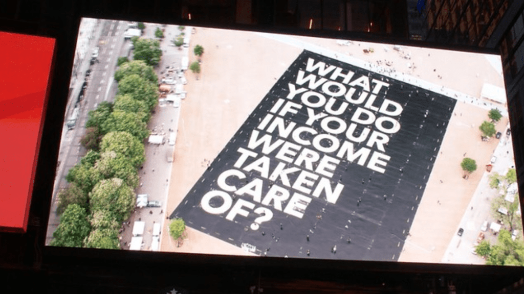Basic Income sign on billboard