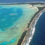 Aerial view of Tuvalu’s capital, Funafuti, 2011. Tuvalu is a remote country of low lying atolls, making it vulnerable to fossil fuel-driven climate change. Photo: Lily-Anne Homasi / DFAT