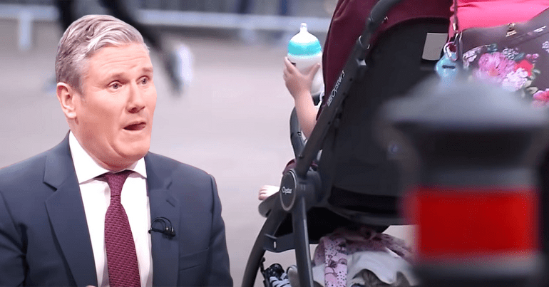 Sir Kid Starver watching a baby holding a milk bottle two-child limit