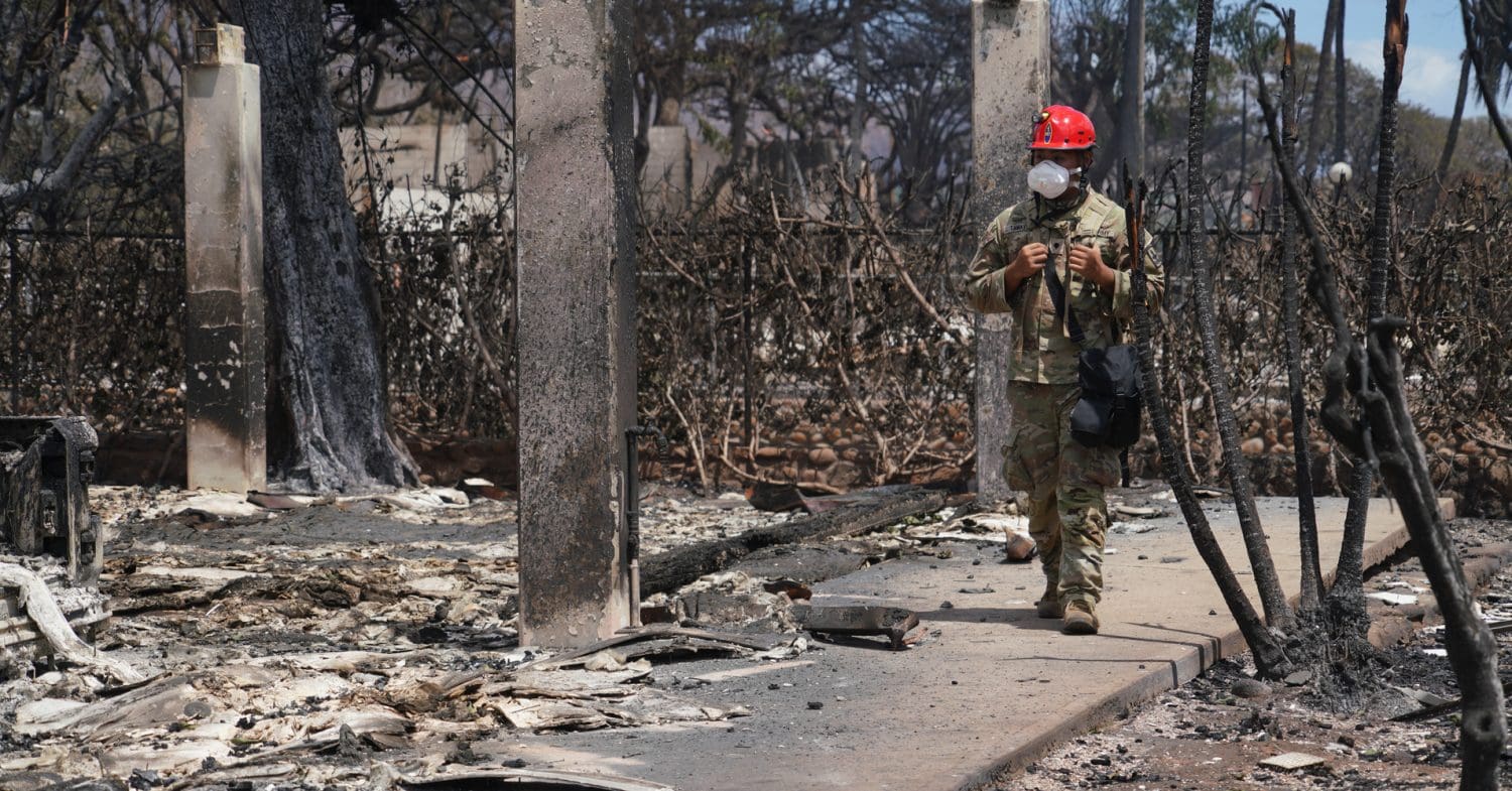 Wreckage from the wildfires in Hawaii, showing burned down buildings and rubble.