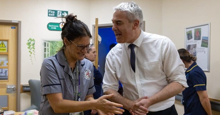Steve Barclay with an NHS worker consultants