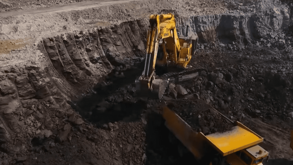 Excavators extract coal from a pit in Thar, Pakistan.