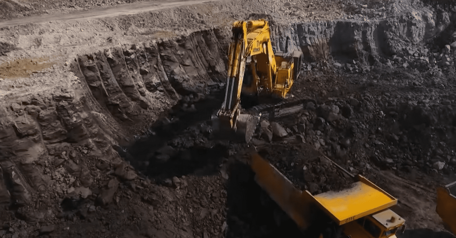 Excavators extract coal from a pit in Thar, Pakistan.