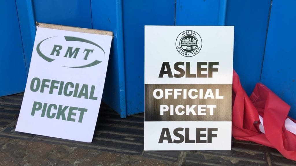 RMT and ASLEF picket placards during train strikes
