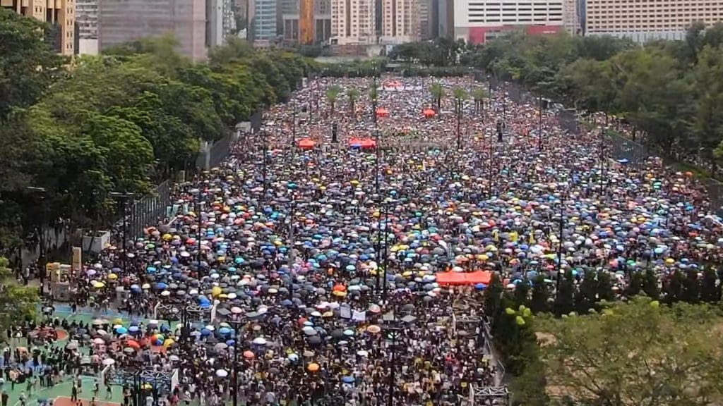 People gather at Victoria Square in Hong Kong on 18 August 2019 during massive protests against China's extradition law