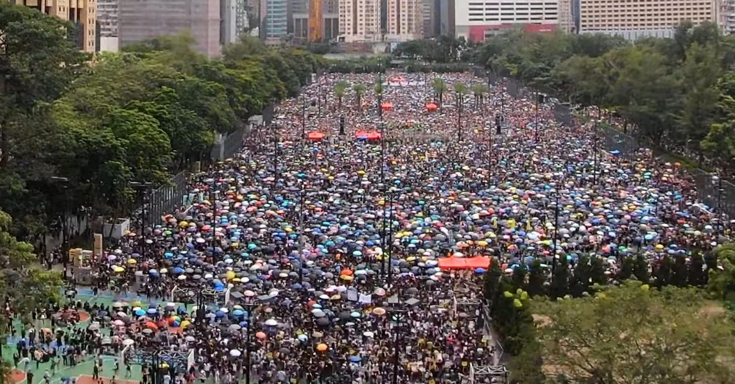 People gather at Victoria Square in Hong Kong on 18 August 2019 during massive protests against China's extradition law