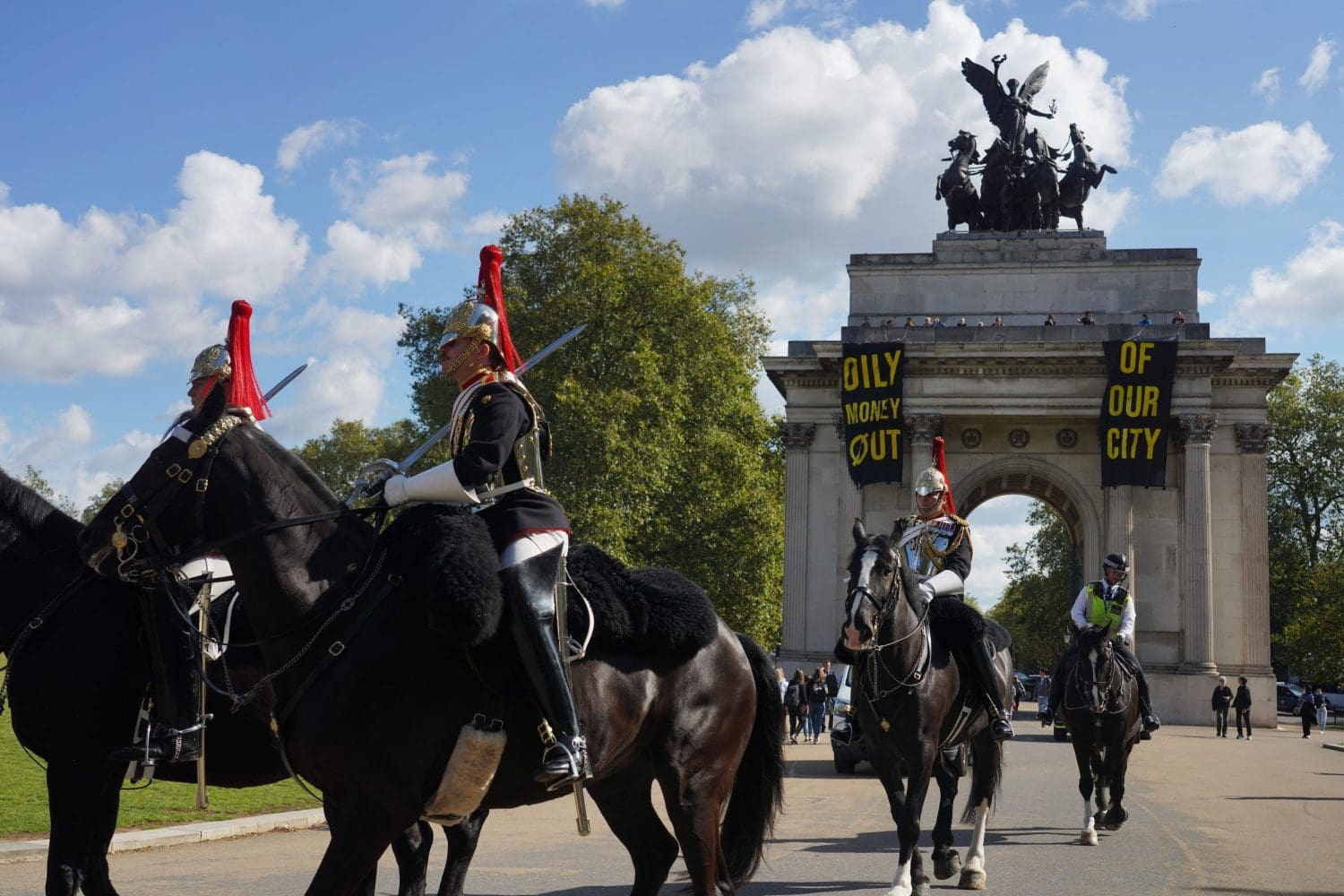 A protest by Fossil Free London at Wellington Arch