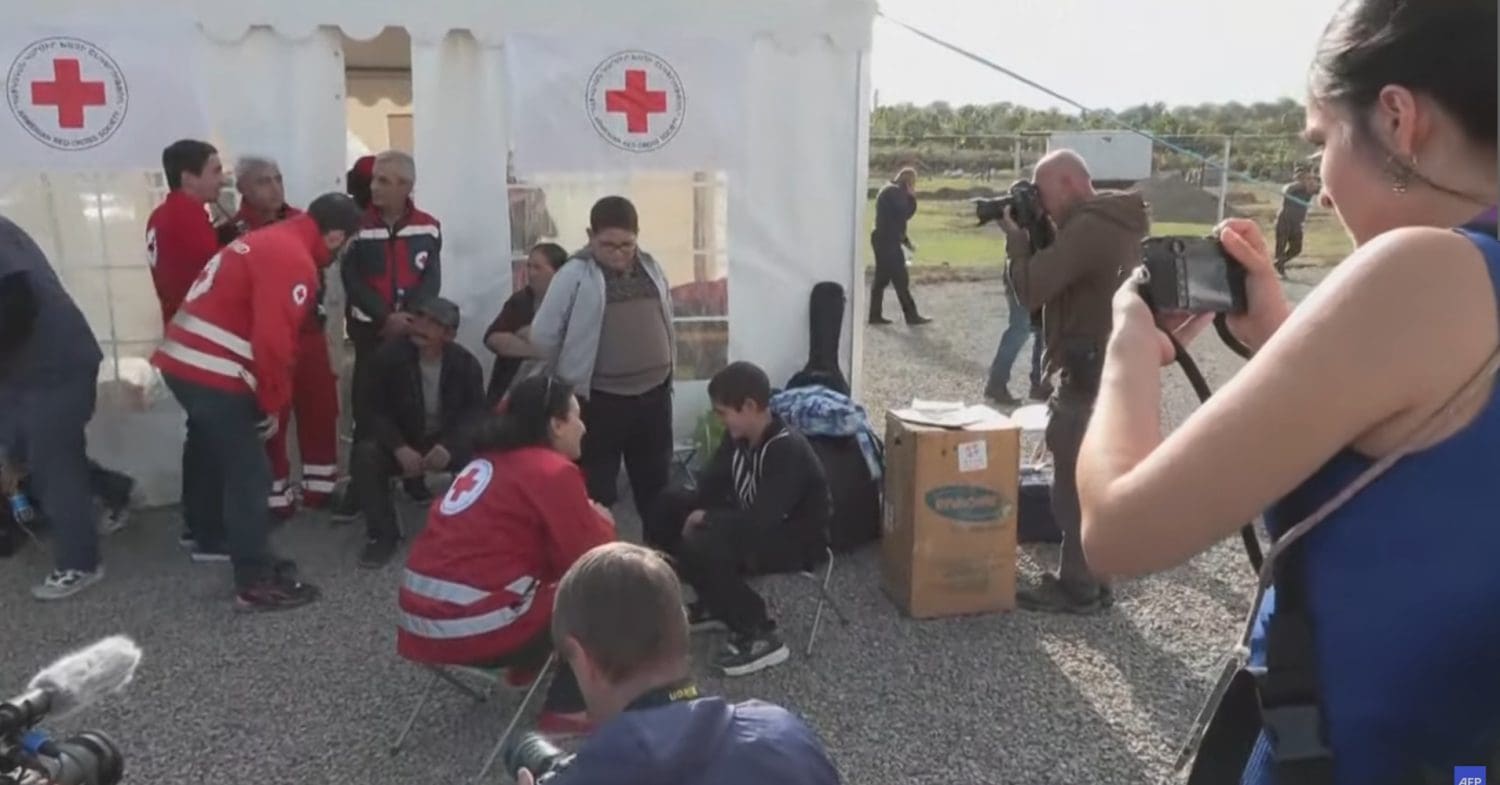 Refugees reach camp on the border of Armenia