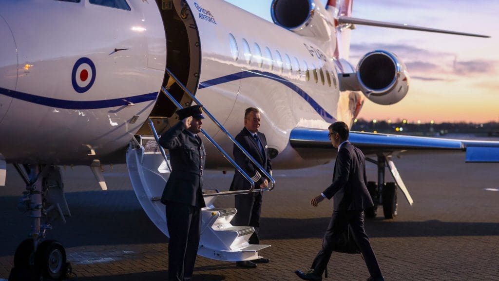 Prime minister Rishi Sunak boards an RAF jet