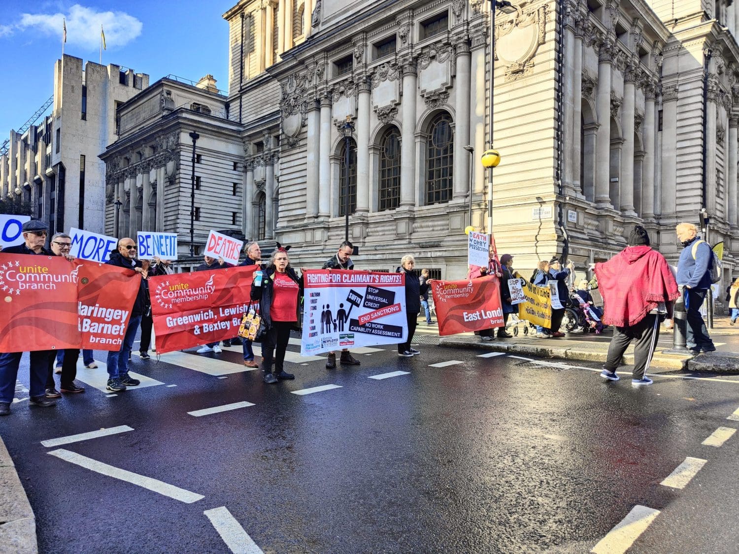 members of dpac and other groups blocking a road as part of their WCA protest