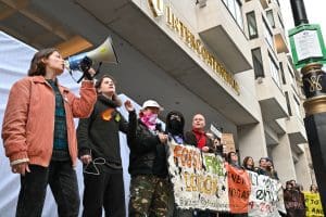 Climate activists including Fossil Free London disrupt the Energy Intelligence Forum, London, UK