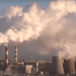 Smoke rising from multiple stacks.