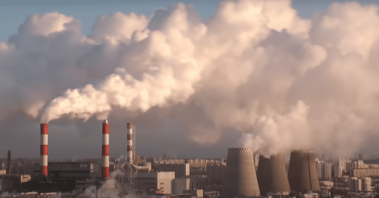 Smoke rising from multiple stacks.