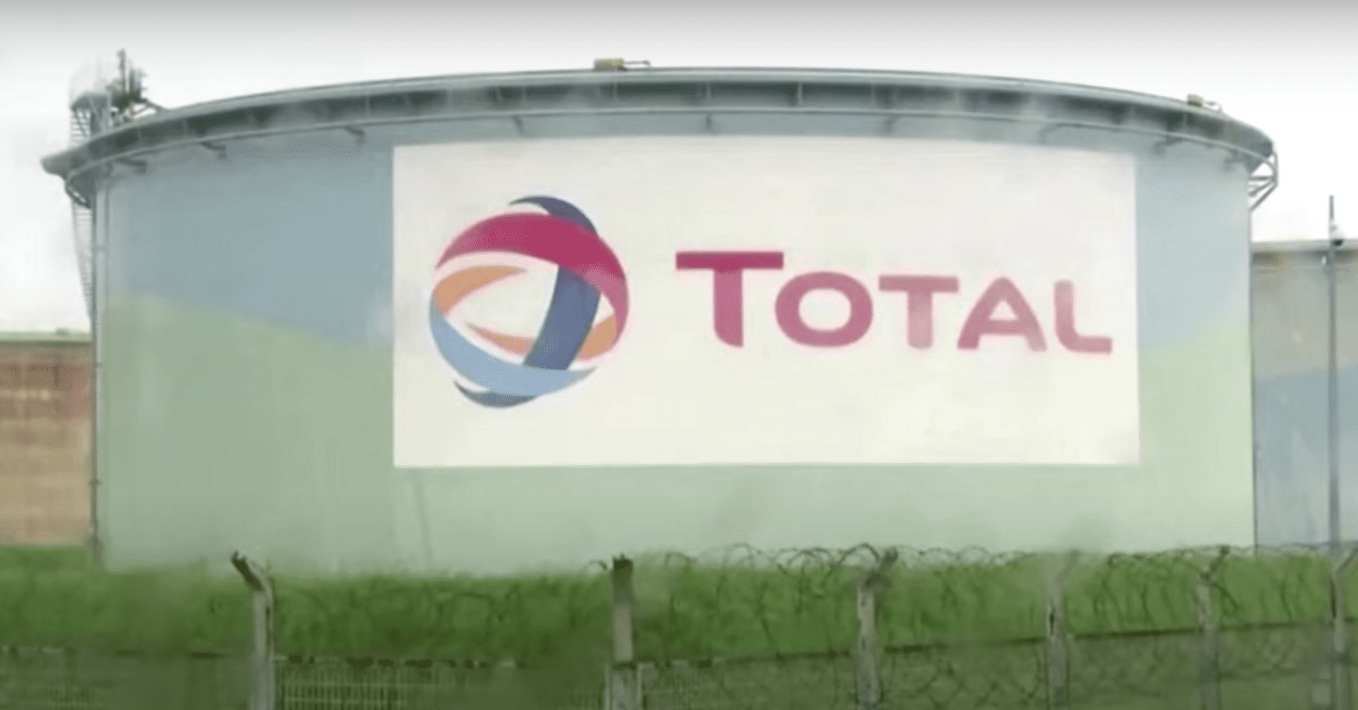 TotalEnergies logo on the side of a building.