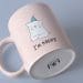 A custom mug which says I'm happy