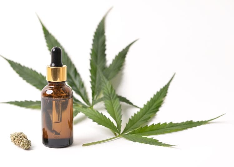 Cannabis leaf and bottle cannabinoids