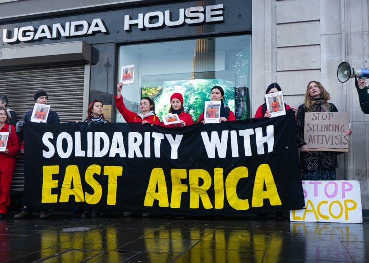 EACOP protest outside the Ugandan embassy banner reads 'solidarity with east africa'